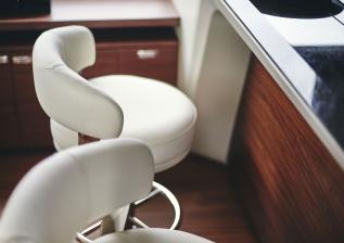 y85-interior-galley-bar-stools-detail-walnut-satin.jpg