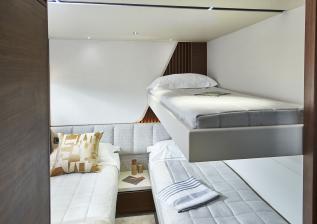 y85-interior-starboard-guest-cabin-with-pullman-bunk-walnut-satin.jpg