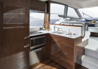 f50-interior-galley-walnut-satin-2022.jpg