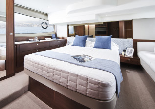 f50-interior-owners-stateroom-walnut-satin.jpg