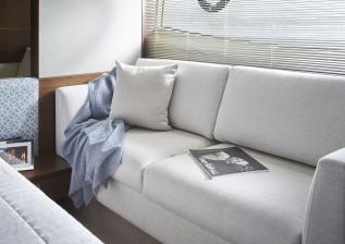 f50-interior-owners-stateroom-sofa-walnut-satin.jpg