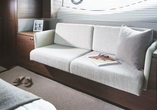 s66-interior-owners-stateroom-sofa-walnut-satin.jpg