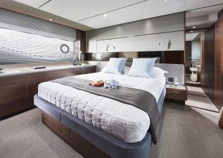 s66-interior-owners-stateroom-walnut-satin.jpg