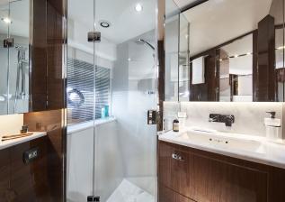 v78-interior-forward-cabin-bathroom-walnut-gloss.jpg