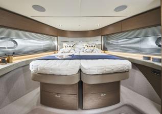 v55-interior-forward-guest-cabin-double-bed-silver-oak-satin.jpg