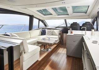 v55-interior-saloon-seating-area-coffee-table-silver-oak-satin.jpg