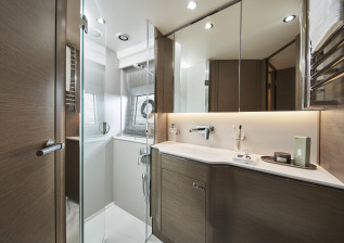 v55-interior-forward-cabin-bathroom-silver-oak-satin.jpg