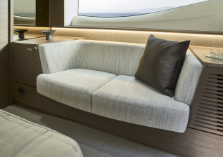 f58-interior-owners-stateroom-sofa-silver-oak.jpg