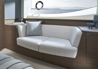 s65-interior-owners-stateroom-sofa-silver-oak-satin.jpeg