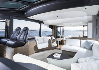 s65-interior-saloon-with-optional-seat-looking-aft-silver-oak-satin.jpeg